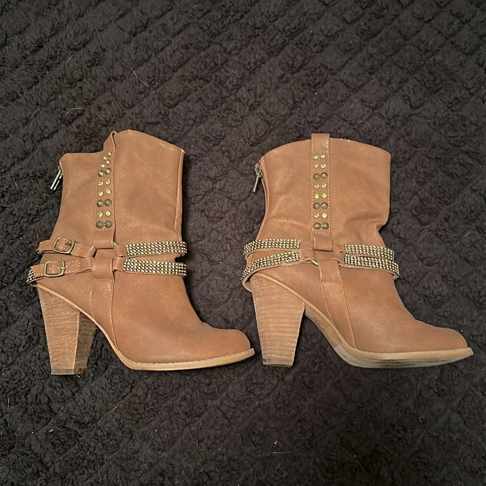 Brown heeled booties with sparkly and studs